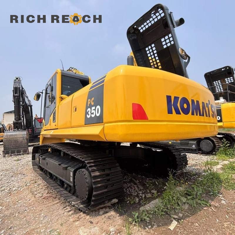 Side profile of a 2018 Komatsu PC350 excavator showing boom and arm, second-hand machine at $41,667